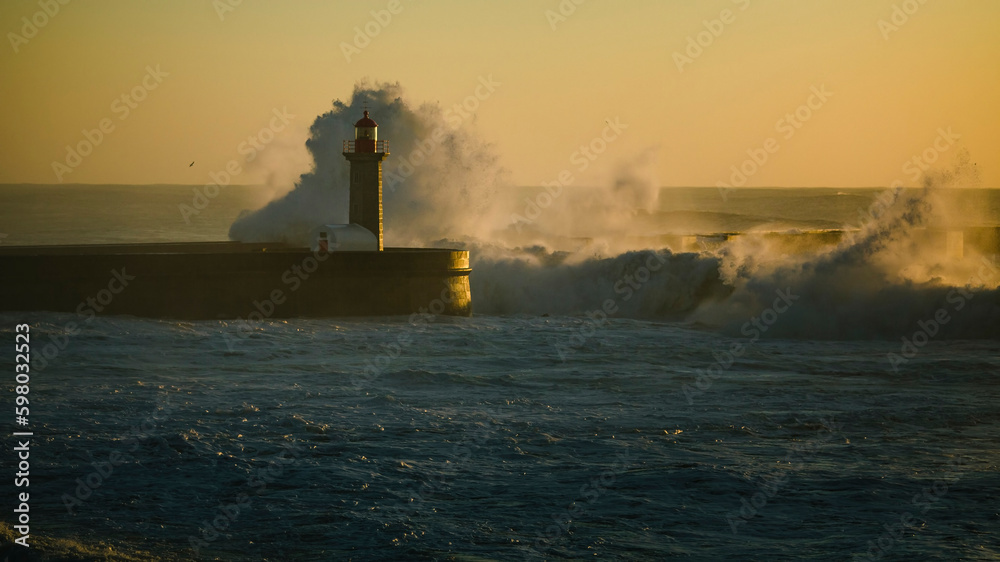 Large waves at the Foz lighthouse in Porto, Portugal.