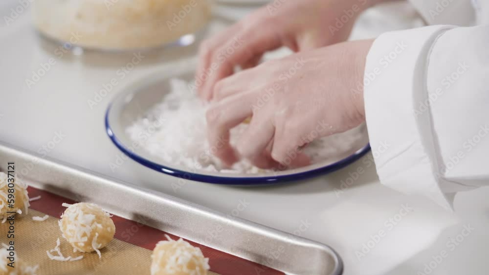 Scooping cookie dough into the baking sheet to bake coconut cookies. Generative AI Scooping cookie dough into the baking sheet to bake coconut cookies. Generative AI