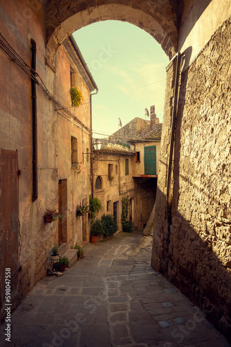 Narrow street in Sorano town in Tuscany, Italy