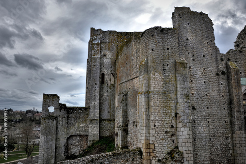 Chauvigny, France - March 25th 2016 : The ruins of the baronial castle, former castle of the Bishops of Poitiers. The building dates from the 12th century. Only ruined walls remain. photo