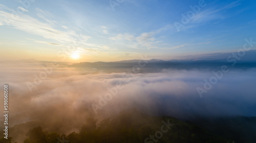 beautiful sea of mist and sunrise, view from Aiyoeweng View Point, Yala Province, © kwanchaichaiudom
