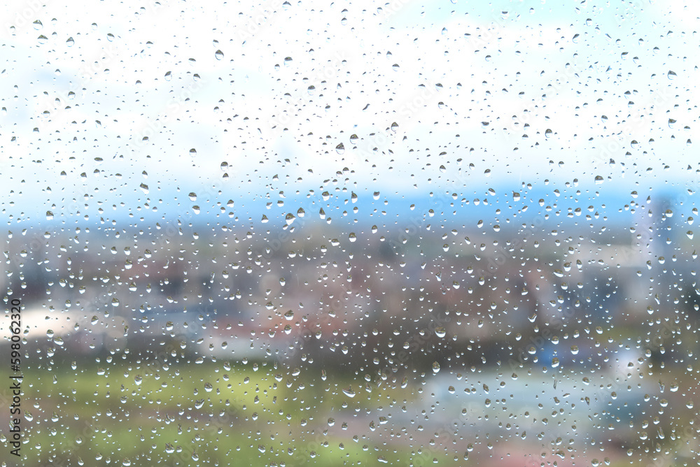 water drops on a window with a blurred background