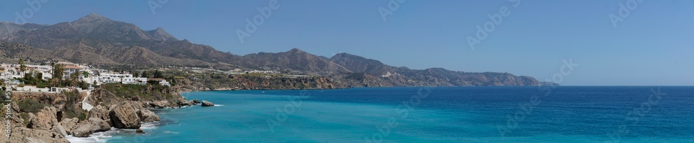 Sea shore and mountains in Nerja, Spain - panorama