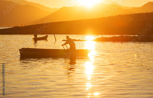 Fisherman on sunrise