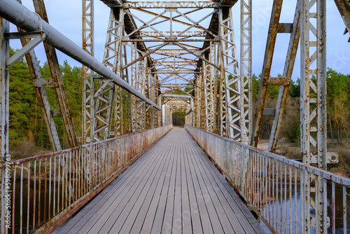 The old railway bridge. Historic narrow gauge railway bridge. A popular walking spot in Valmiera, Latvia photo