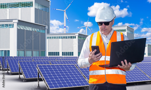 Solar power plant. Man engi...