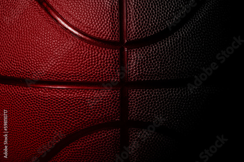 Closeup detail of red basketball ball texture background. Horizontal sport theme poster, greeting cards, headers, website and app