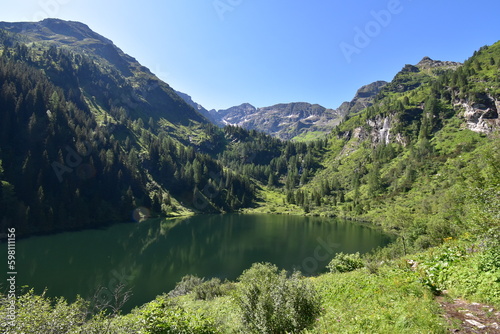 Hüttensee im Naturschutzgebiet Bodensee mit Blick auf Hochwildstelle, Schladminger Tauern, Steiermark photo
