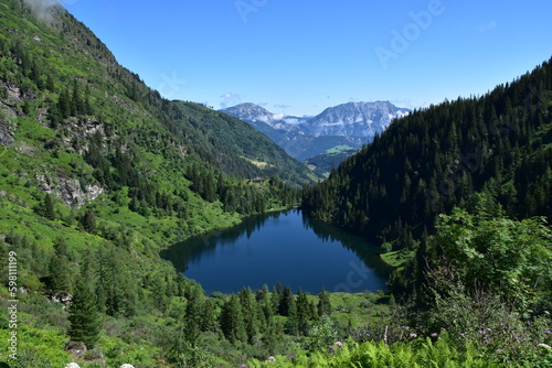 Hüttensee im Naturschutzgebiet Bodensee mit Blick auf Stoderzinken und Kammspitz, Schladminger Tauern, Steiermark photo
