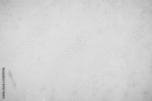 Concrete on stone texture for background in black, grey and white colors. Cement and sand wall of tone vintage. Close up retro plain white color concrete.
