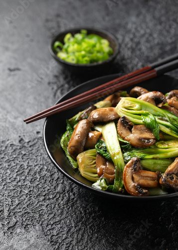 Bok Choy or Pak Choi and Mushroom Stir Fry in vegetarian sauce. Healthy vegan food.