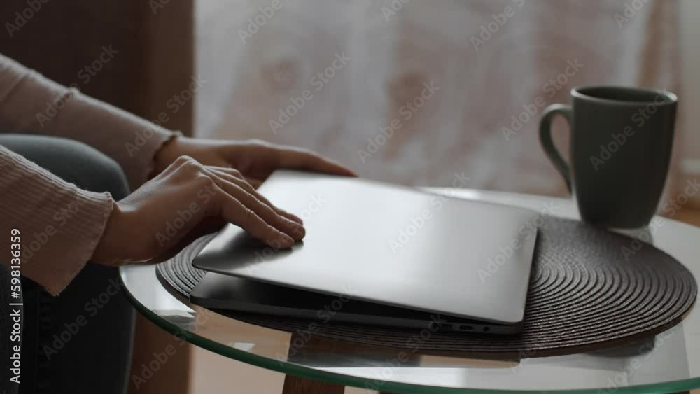 Remote work and freelance. Unrecognizable lady opening laptop, preparing to work or web surfing online, slow motion Generative AI Remote work and freelance. Unrecognizable lady opening laptop, preparing to work or web surfing online, slow motion Generative AI