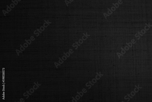 Black hemp rope texture background. Haircloth wale black dark cloth wallpaper. Rustic sackcloth canvas fabric texture in natural.