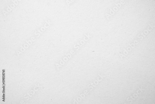 White recycled craft paper texture as background. Grey paper texture cardboard.