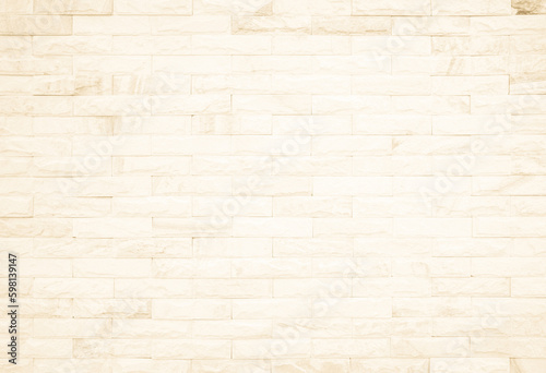 Cream and white brick wall texture background. Brickwork and stonework flooring interior rock old pattern design. 