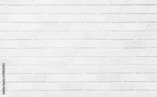 Detail of modern white brick wall background photo. White brick wall texture background for stone tile block painted in grey light color wallpaper modern interior and exterior and backdrop design.