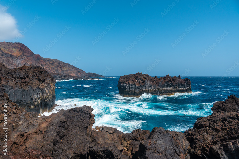 Roque de Las Gaviotas seen from the volcanic trail in the village of Tamaduste on the island of El Hierro, Canary Islands, Spain