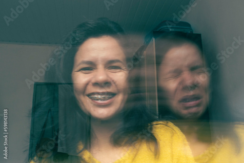 Laughing happy on the outside, crying sad on the inside. Broken soul. Soul leaving the body screaming. Desperate emotion. Sadness. Depression. Fake happiness. How I look vs how I really feel