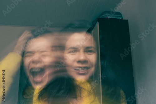 Laughing happy on the outside, crying sad on the inside. Broken soul. Soul leaving the body screaming. Desperate emotion. Sadness. Depression. Fake happiness. How I look vs how I really feel