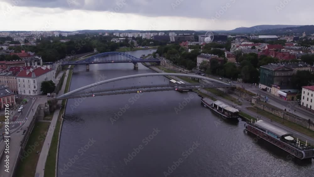 Aerial view of Krakow's Old Town and Vistula River from a Drone's Perspective Aerial view of Krakow's Old Town and Vistula River from a Drone's Perspective