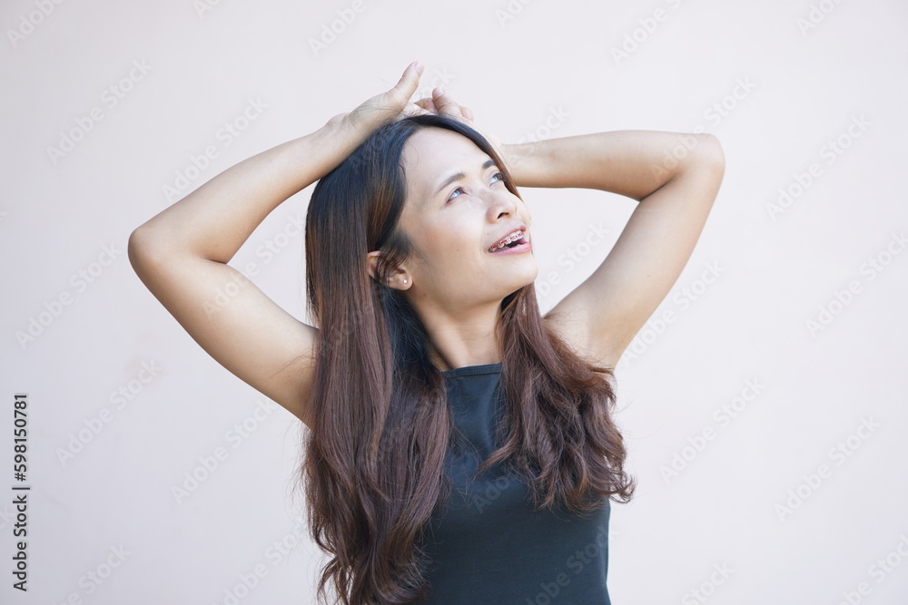  Asian woman smiling happily braces