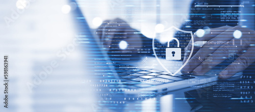 Cyber security network system, data protection concept. Businessman using laptop computer with digital padlock, data encryption technology, cybersecurity Internet access