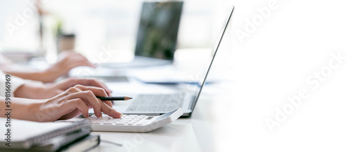 Businesswoman or accountant working Financial investment on calculator, calculate, analyze business and marketing growth on financial document