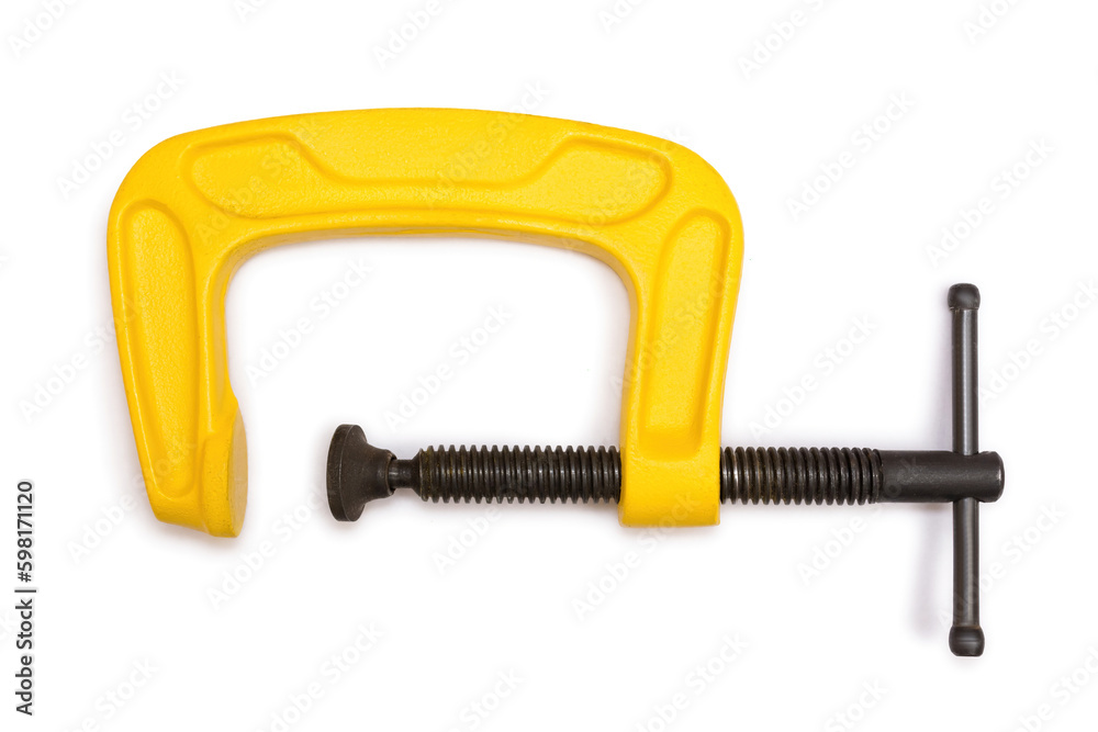 Yellow steel clamp tool isolated on white background Yellow steel clamp tool isolated on white background