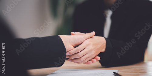 Businessmen shaking hands to indicate a business deal,successful contract management of the company,signing an agreement,business partner,New opportunities for the future of the industry,joint venture