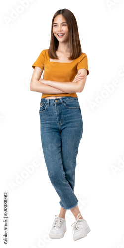 Happy smiling young woman wearing casual orange t-shirt with standing and looking at camera arms crossed on png background.