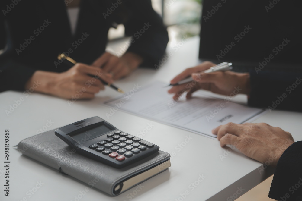 Close up view of job interview in office, focus on resume writing tips, employer reviewing good cv of prepared skilled applicant, recruiter considering application, hr manager making hiring decision Close up view of job interview in office, focus on resume writing tips, employer reviewing good cv of prepared skilled applicant, recruiter considering application, hr manager making hiring decision
