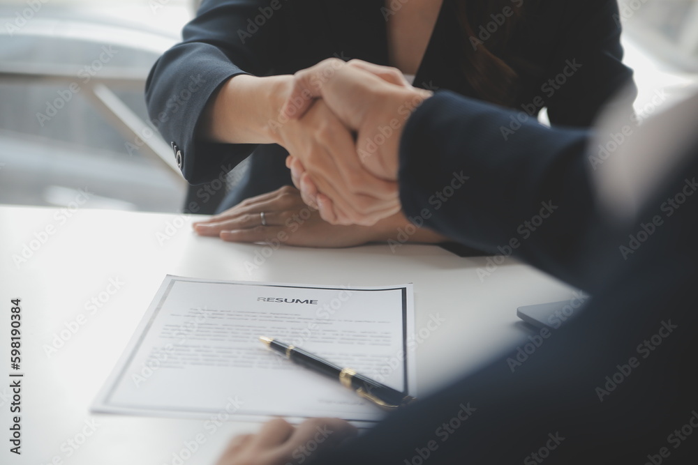 Close up view of job interview in office, focus on resume writing tips, employer reviewing good cv of prepared skilled applicant, recruiter considering application, hr manager making hiring decision Close up view of job interview in office, focus on resume writing tips, employer reviewing good cv of prepared skilled applicant, recruiter considering application, hr manager making hiring decision