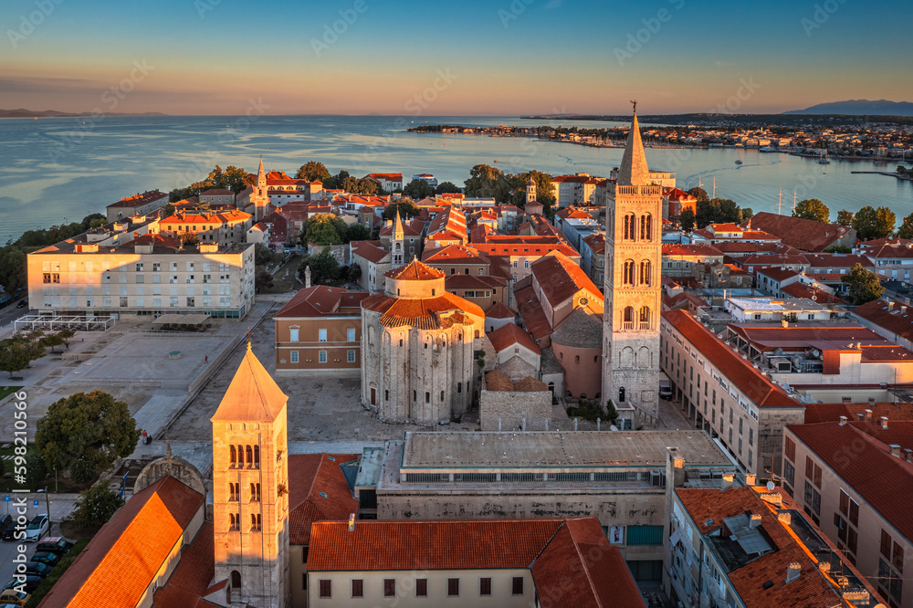 Zadar, Croatia - Aerial view of the old town of Zadar by the Adriatic sea with Church of St. Donatus and the Cathedral of St. Anastasia and blue sky on a bright summer morning