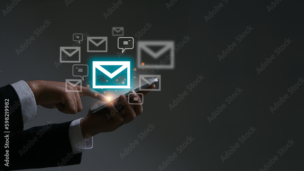 Email concept.Businessman using smart phone for email with notification alert, Online communication concept.email icons. Email concept.Businessman using smart phone for email with notification alert, Online communication concept.email icons.