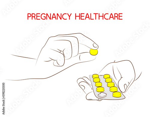 Pregnancy healthcare. Taking pills or prenatal vitamins during pregnancy. Female hand holds tablets in blister pack, close-up. Medical, treatment and healthcare concept. Pharmacy help, medicine drug