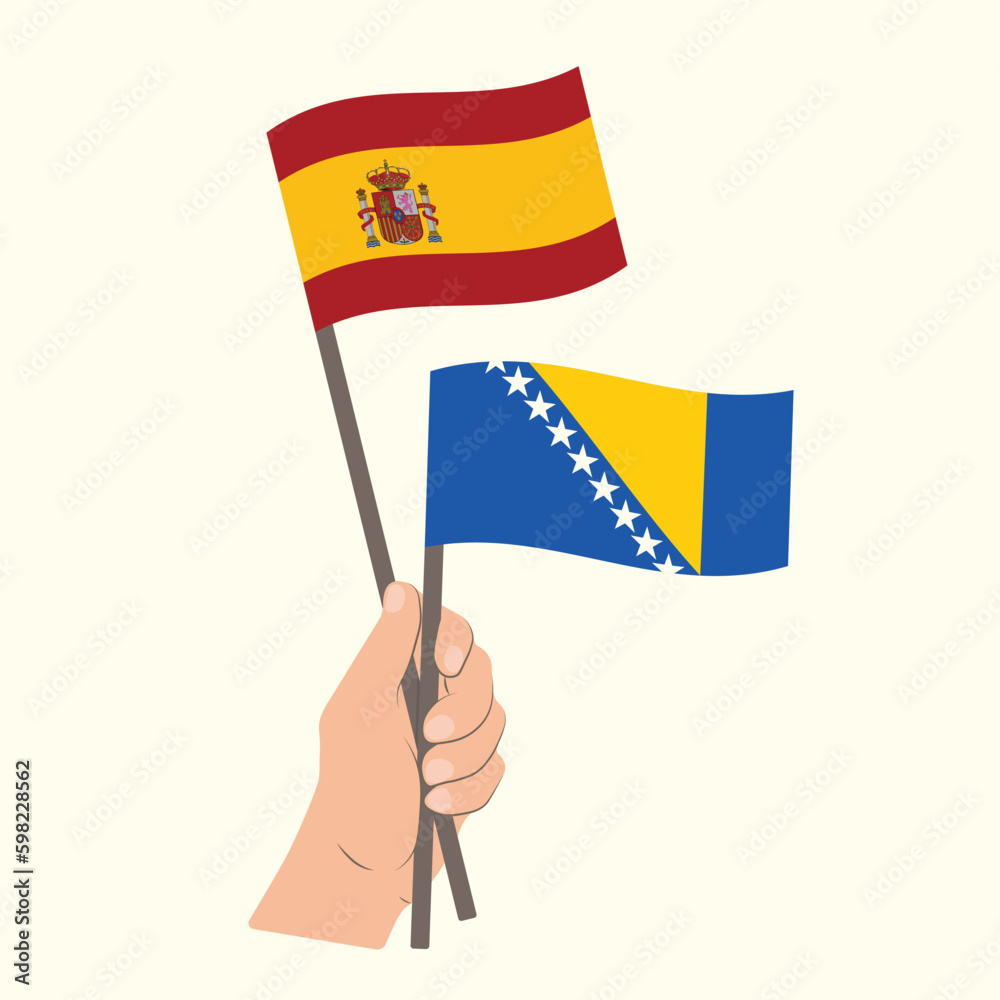 Flags of Spain and Bosnia and Herzegovina, Hand Holding flags Flags of Spain and Bosnia and Herzegovina, Hand Holding flags