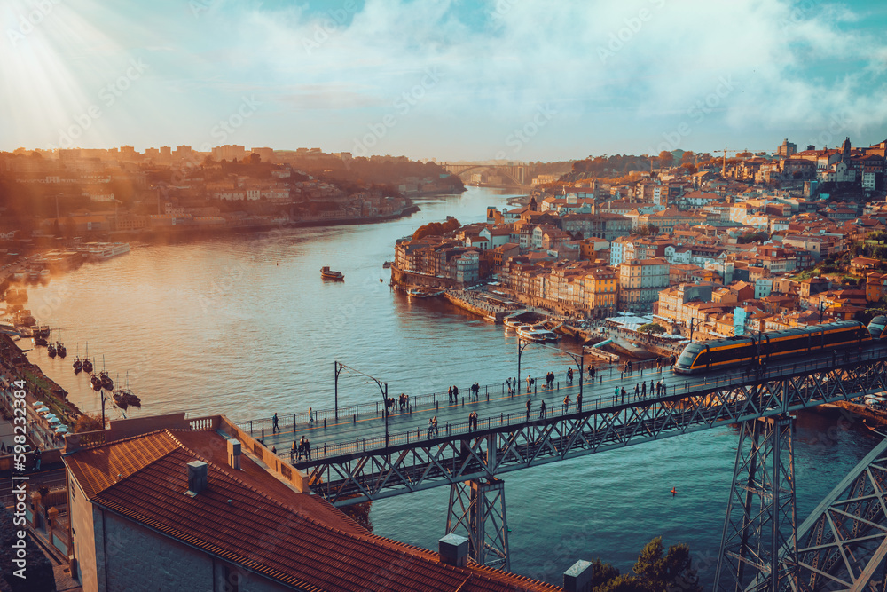 Porto, Portugal Dom Luis Iron Bridge featuring Douro River, Metro Train and Port Wine Boats 