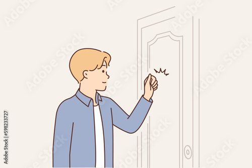 Young man knocks on door when comes to visit friend or company office to get job Generative AI
