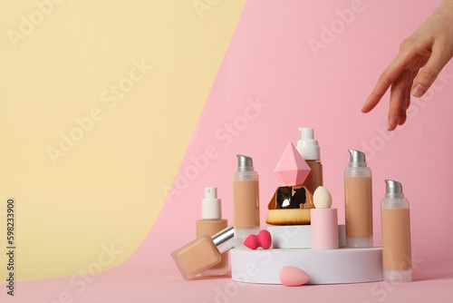 Concept of cosmetic and make up accessories - foundation, space for text