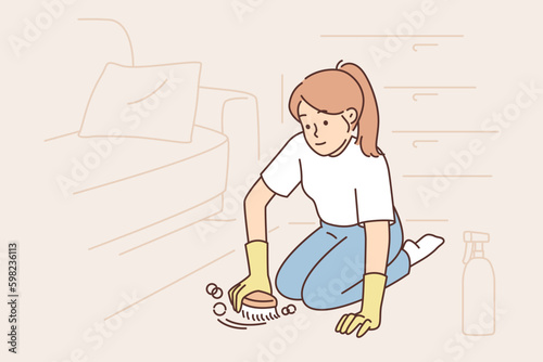 Woman cleans carpet using chemical detergent and brush to get rid of dust or stains Generative AI