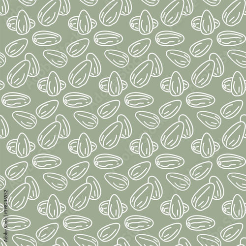 A pattern with contour sketches of almonds. The symbol is a doodle of nuts on a green background. Printing on textiles and paper background for packaging vegetable milk with almonds. A handful