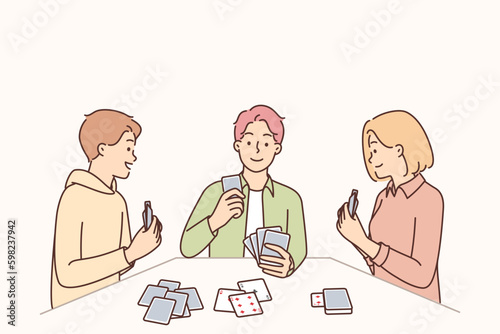 Friends playing cards sitting at table spending time together enjoying game of poker Generative AI