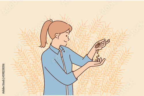 Woman agronomist inspects grains of soybean crop standing on agricultural plantation or farmland Generative AI