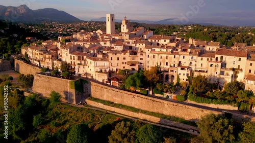 view from the top of the hill to village on sunset 