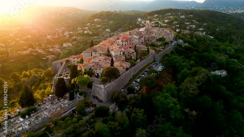 view from the top of the hill to village on sunset 