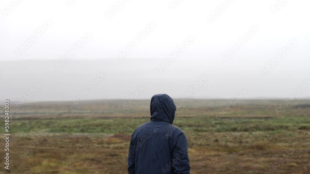 Man Standing In The Icelandic Countryside Man Standing In The Icelandic Countryside