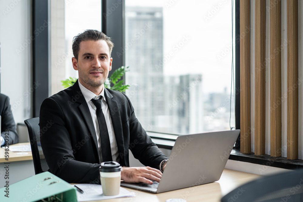 Portrait of Caucasian handsome business man work in office workplace. Portrait of Caucasian handsome business man work in office workplace.
