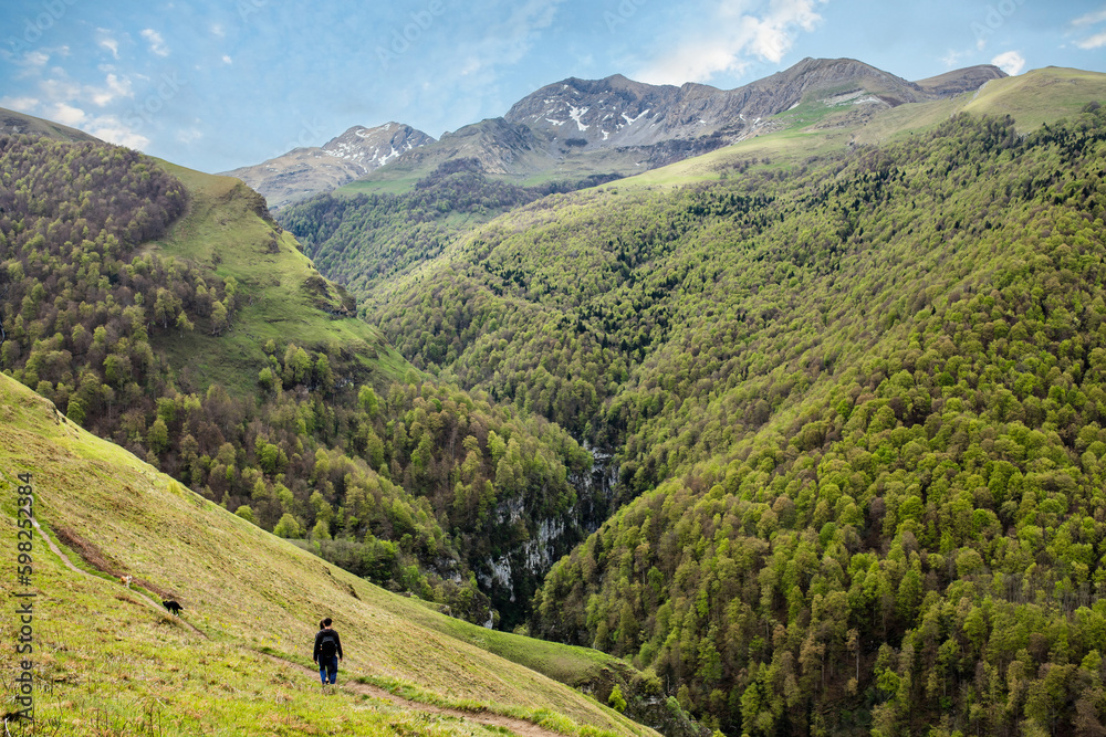 Young couple hiking in the mountains of the French Basque Country