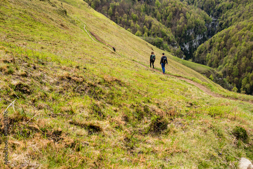 Young couple hiking in the mountains of the French Basque Country © Image'in