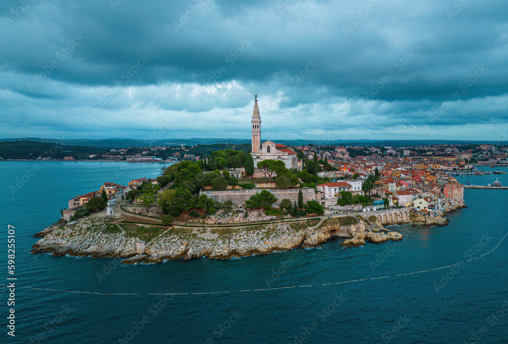 Rovinj with dramatic clouds in an aerial view